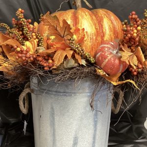 Porch bucket with floral arrangement