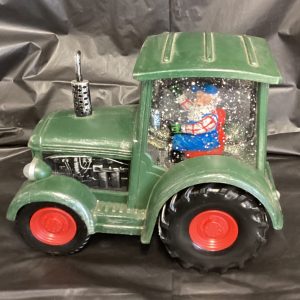 Santa driving tractor waterglobe